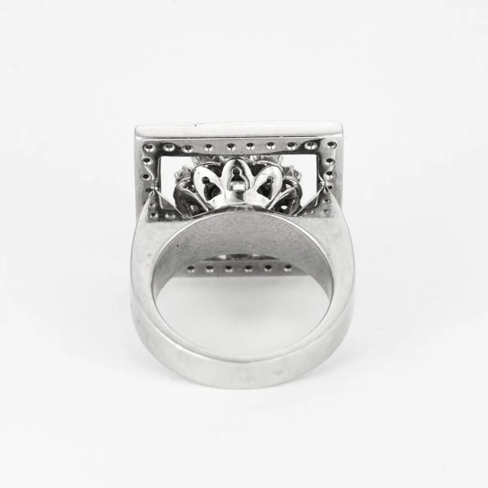 Bague fleur, or blanc et diamants