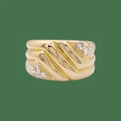 Bague godrons en or jaune et diamants.