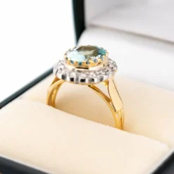 Bague grappe de diamants aigue-marine