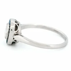 Bague halo en platine avec saphir et diamant