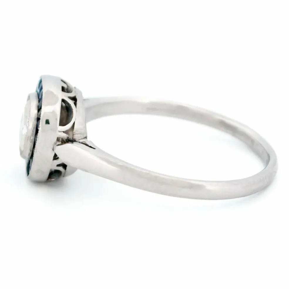 Bague halo en platine avec saphir et diamant