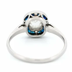 Bague halo en platine avec saphir et diamant