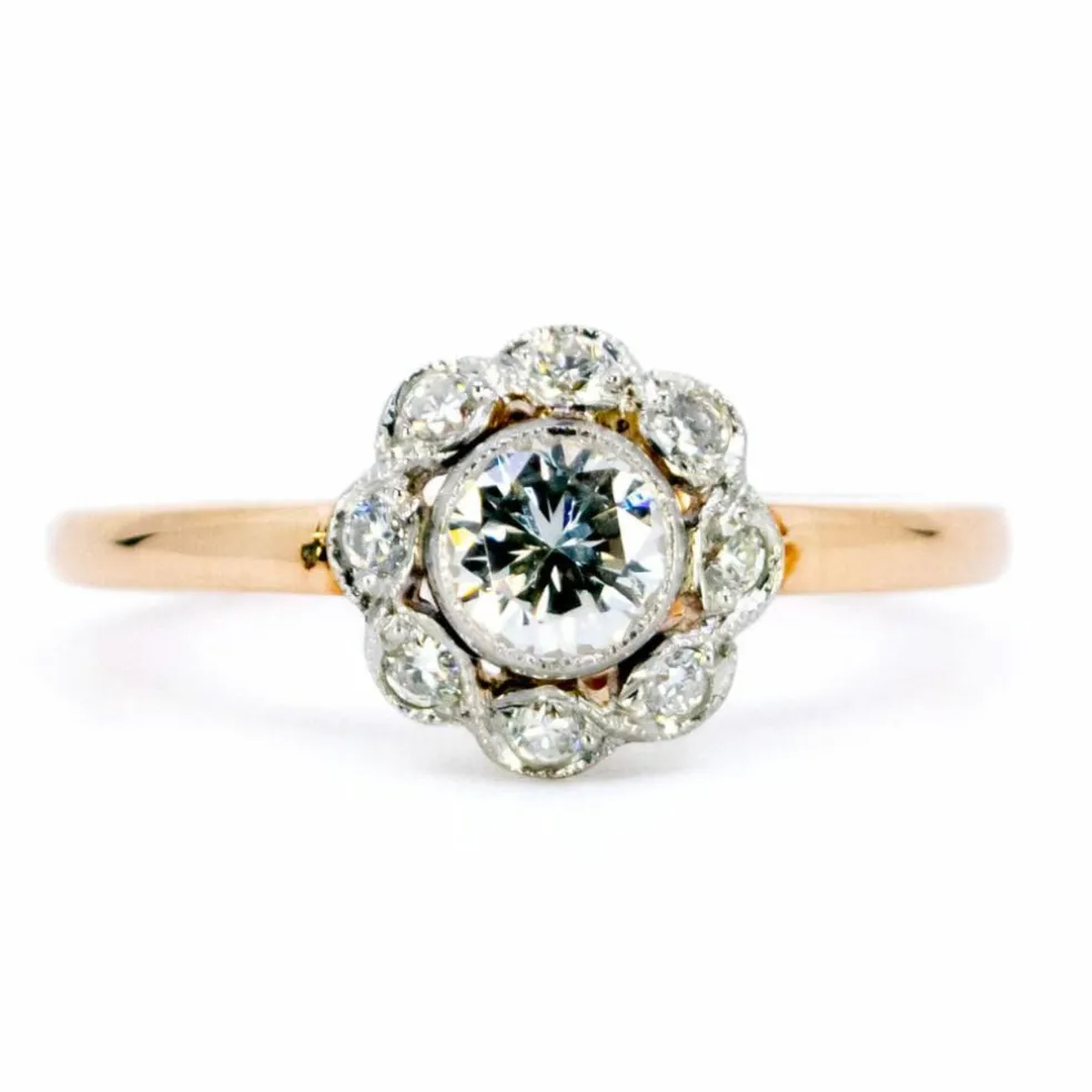 Bague halo en platine et diamants