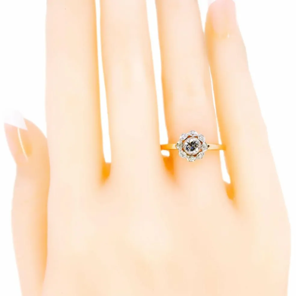 Bague halo en platine et diamants