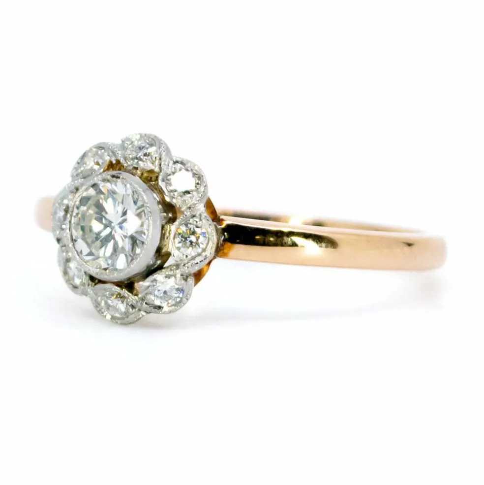 Bague halo en platine et diamants