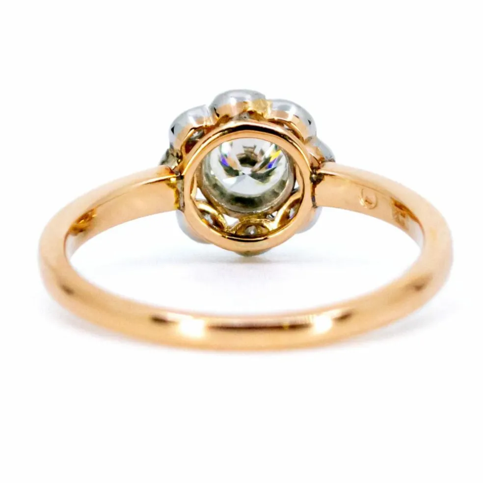 Bague halo en platine et diamants