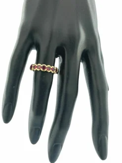 Bague italienne eternity en or jaune et rubis