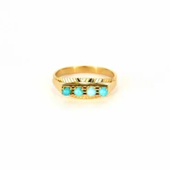 Bague jarretière turquoises en or rose