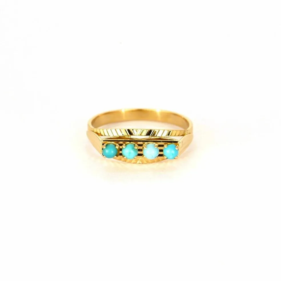 Bague jarretière turquoises en or rose