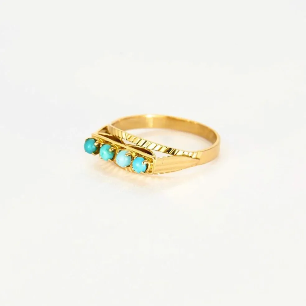 Bague jarretière turquoises en or rose