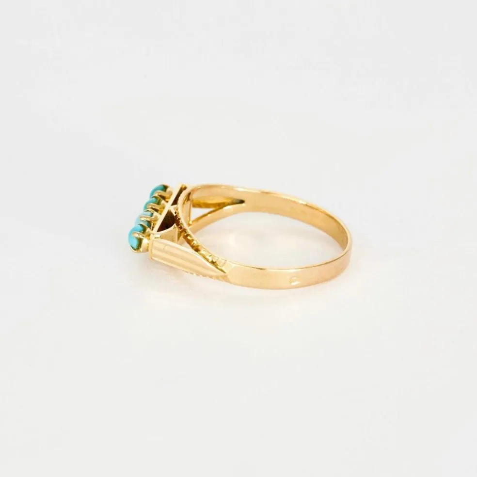 Bague jarretière turquoises en or rose