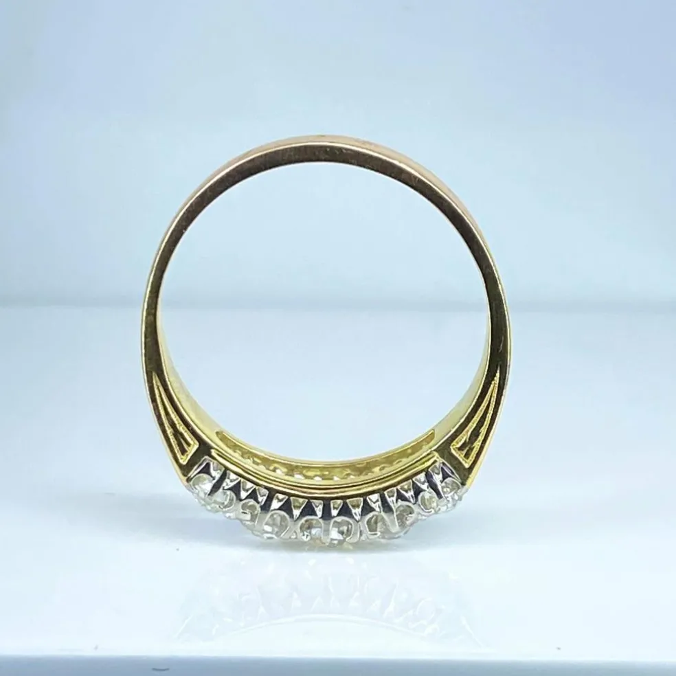 Bague jonc en or jaune 18 carats sertie de 5 diamants, vers 1900