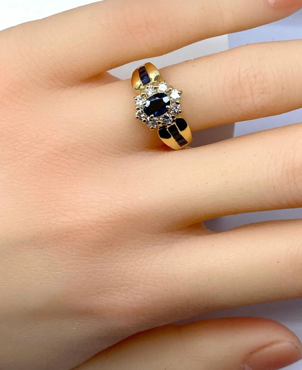 Bague jonc marguerite en or jaune en saphirs et diamants