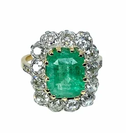 Bague marguerite en or 18 carats, émeraude 3,49 ct et diamants