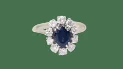 Bague marguerite en or blanc, saphir ovale et diamants