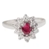 Bague marguerite en or blanc, rubis et diamants