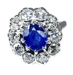 Bague marguerite en or blanc et platine en saphir et diamants