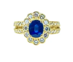 Bague marguerite en or jaune 18 carats, saphir et diamants