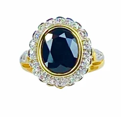 Bague marguerite en or jaune 18 carats, saphir et diamants