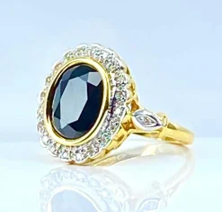 Bague marguerite en or jaune 18 carats, saphir et diamants