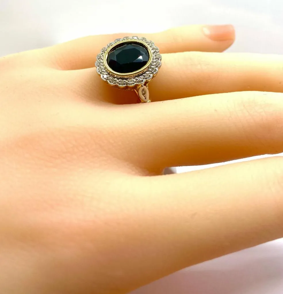 Bague marguerite en or jaune 18 carats, saphir et diamants