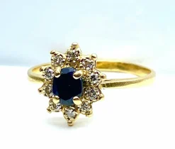 Bague marguerite en or jaune 18 carats, saphir et diamants