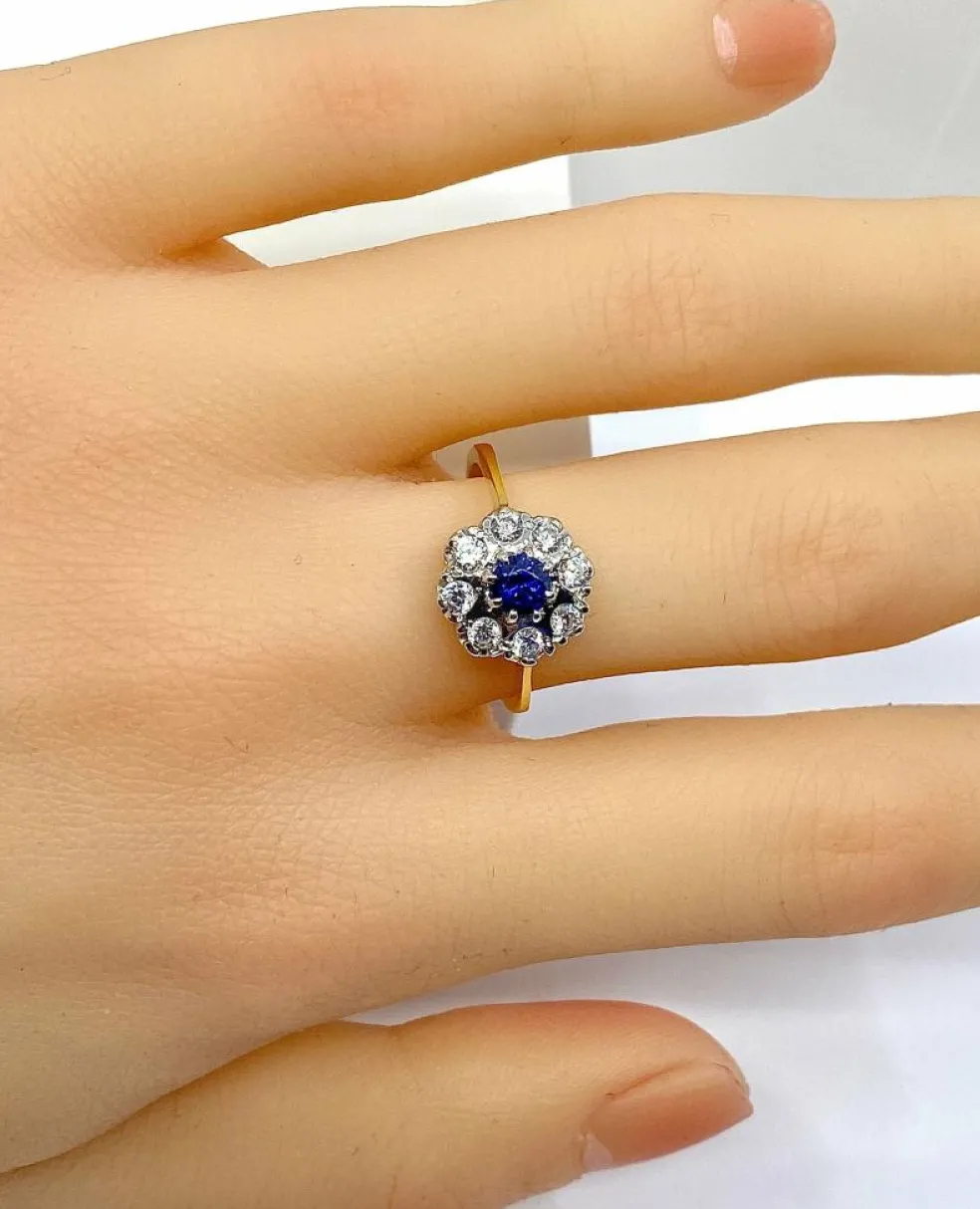 Bague marguerite en or, saphir et diamants