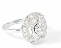 Bague marguerite en platine or gris et diamants