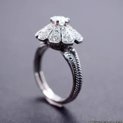 Bague marguerite or blanc et platine diamants époque art déco