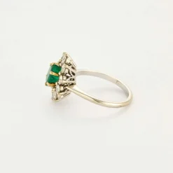 Bague Marguerite or gris et jaune, diamants et émeraude