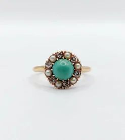 Bague marguerite or jaune, cabochon de turquoise, diamants et perles (circa 1900)