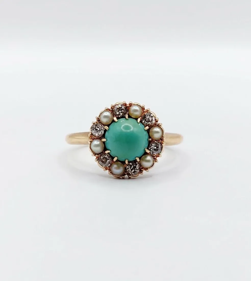 Bague marguerite or jaune, cabochon de turquoise, diamants et perles (circa 1900)