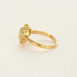 Bague marguerite or jaune, émeraude et diamants