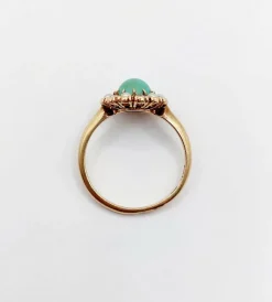 Bague marguerite or jaune, cabochon de turquoise, diamants et perles (circa 1900)