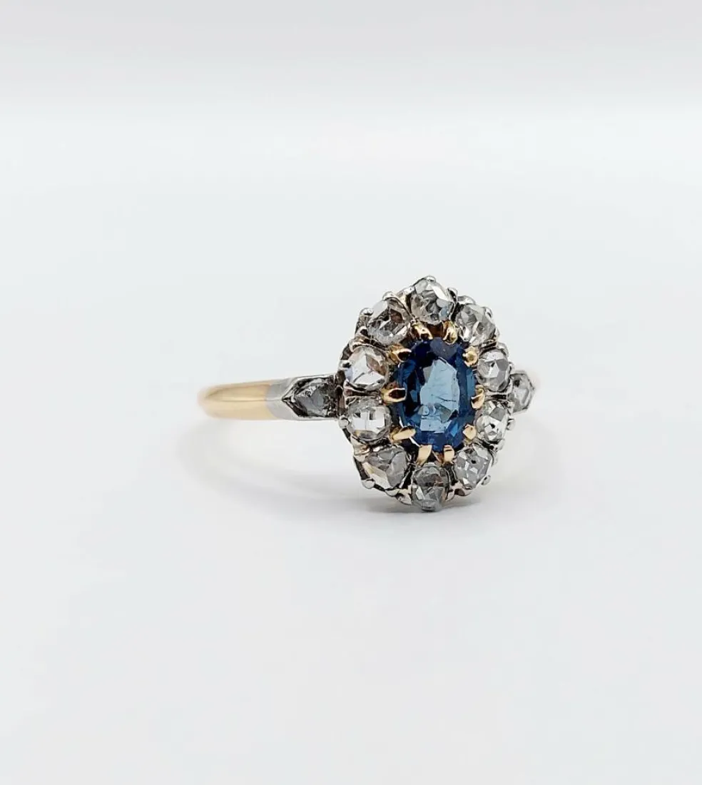Bague marguerite or jaune, saphir synthétique et diamants (circa 1900)