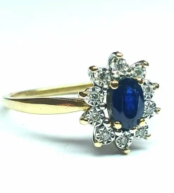 Bague marguerite or jaune, saphir, diamants