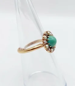 Bague marguerite or jaune, cabochon de turquoise, diamants et perles (circa 1900)