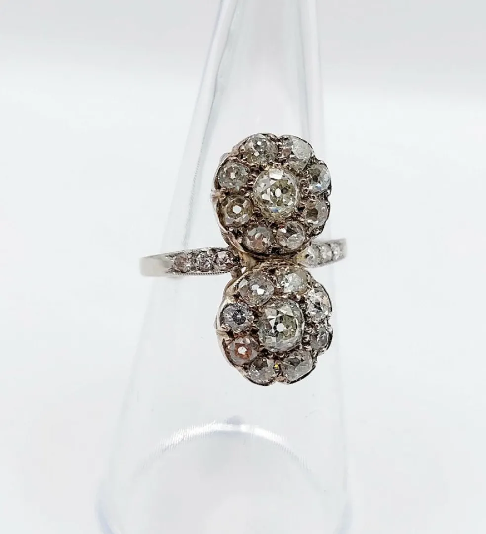 Bague marquise art deco Platine formant deux marguerites de diamant taille ancienne