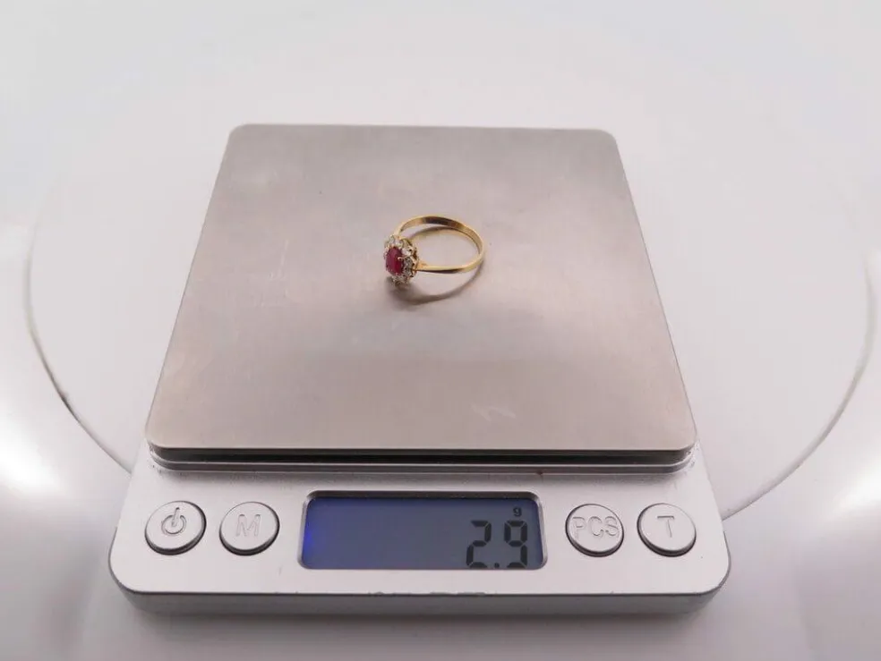 bague marquise en or jaune 18k sertie rubis 0.29ct diamants 0.45ct t56