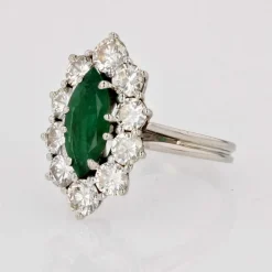 Bague marquise émeraude diamants