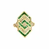 Bague Marquise or jaune, diamants et émeraudes
