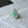 Bague émeraude colombienne poire entourage diamants