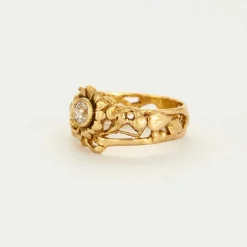 Bague motif floral or jaune et diamant