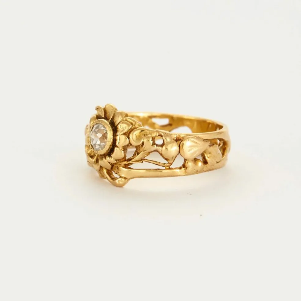 Bague motif floral or jaune et diamant