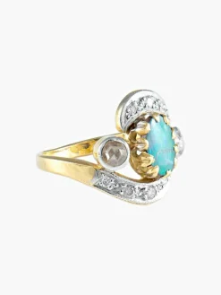 Bague Mouvementée Emeraude Diamants