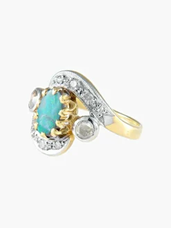Bague Mouvementée Emeraude Diamants