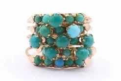 Bague multi-anneaux en or jaune sertie de turquoises