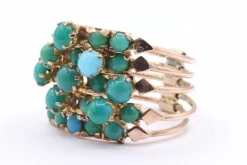 Bague multi-anneaux en or jaune sertie de turquoises
