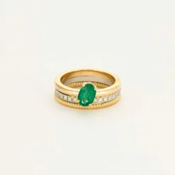 Bague multi-anneaux or jaune platine diamants et émeraude.