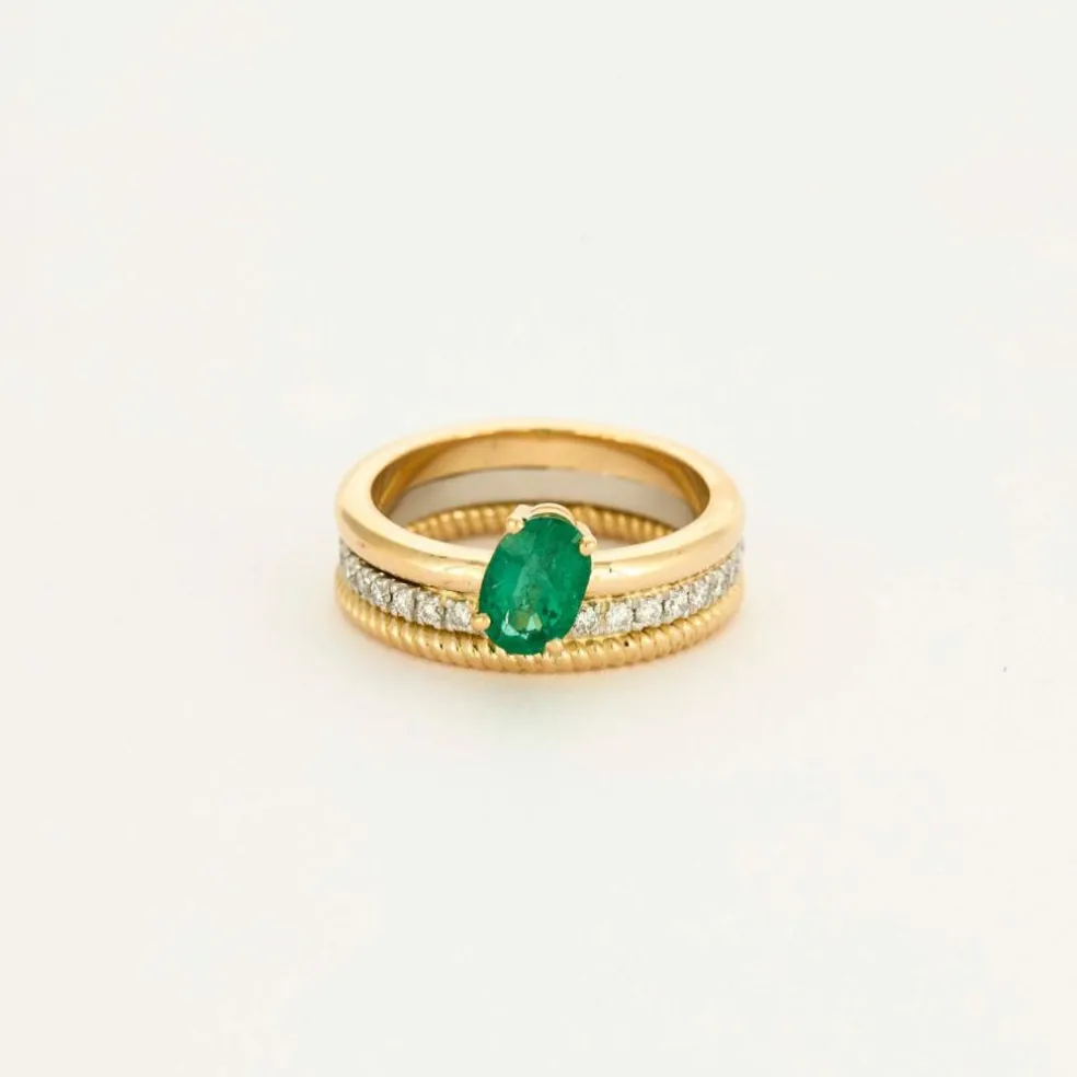 Bague multi-anneaux or jaune platine diamants et émeraude.
